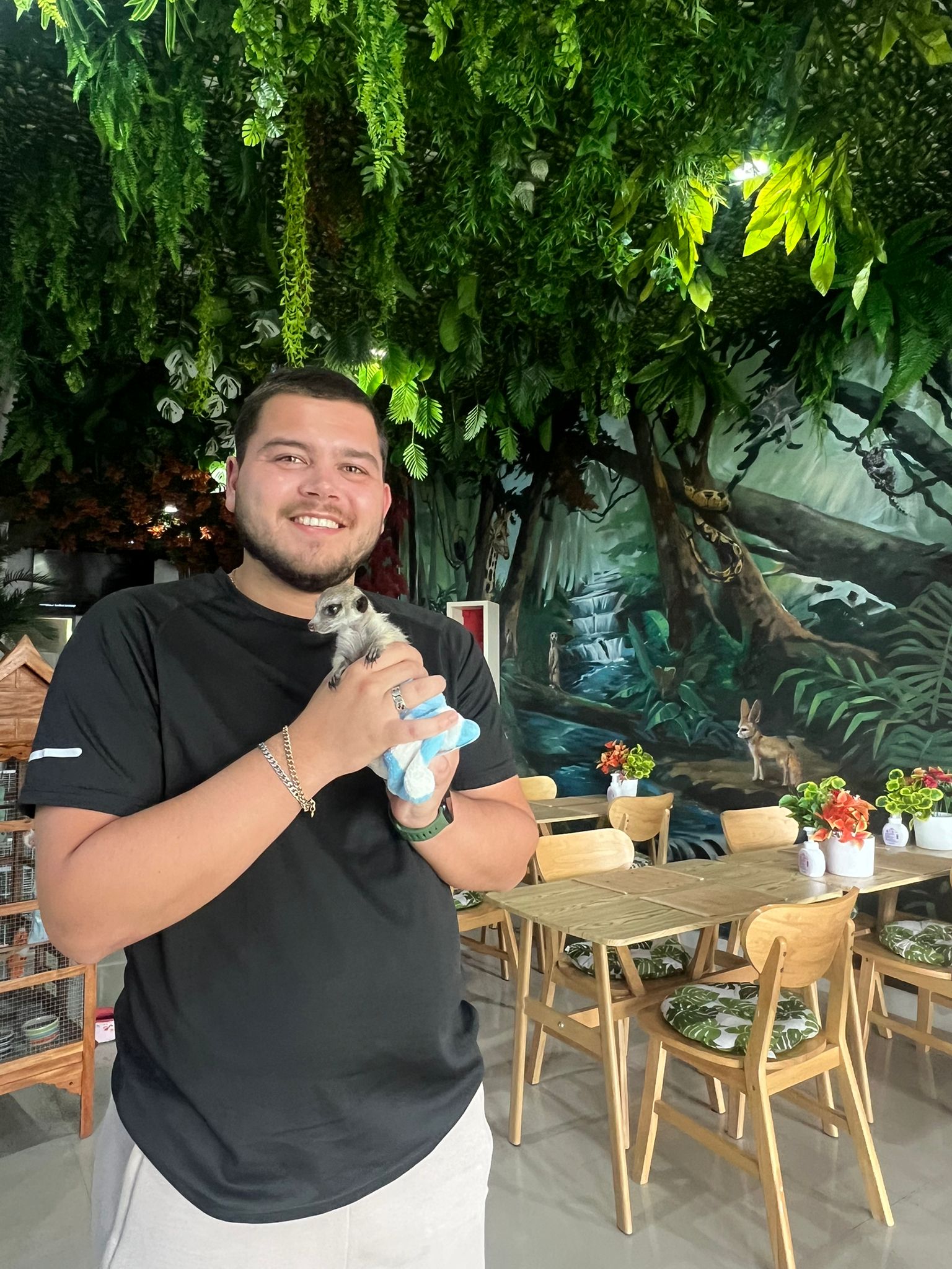 Beavers Animal Cafe children playing with animals educational experience Thailand